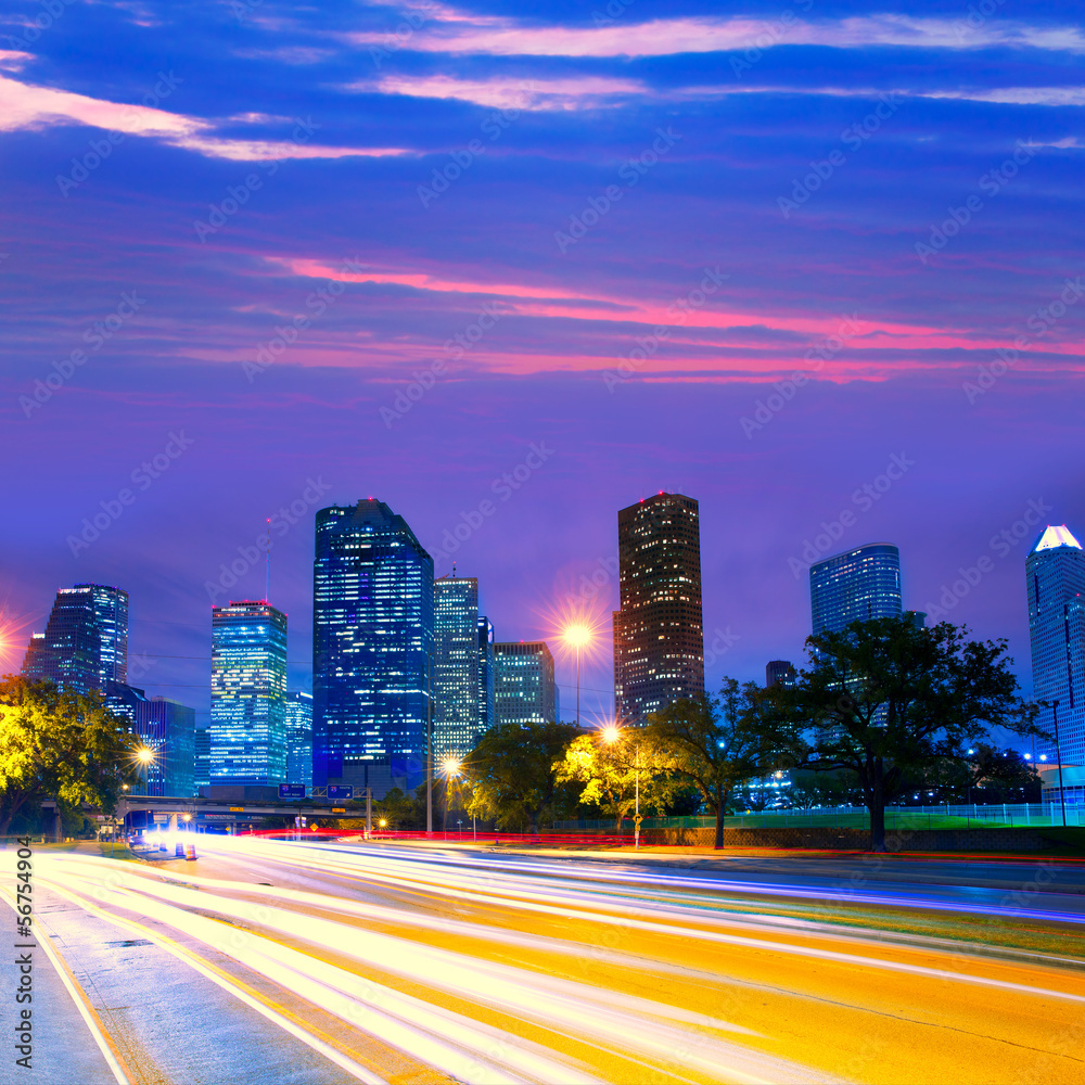 Houston Texas skyline at sunset with traffic lights