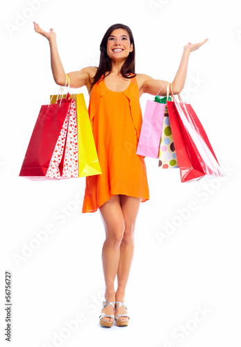 Happy shopping girl with bags.