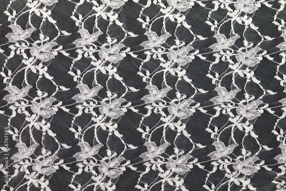 White lace over black background. White lace over black background.