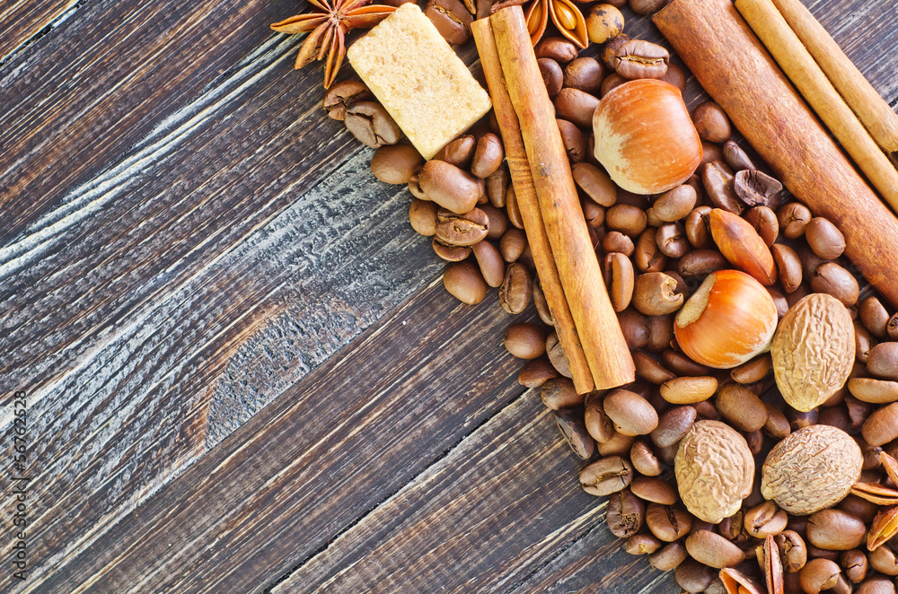 coffee and aroma spice on wooden background