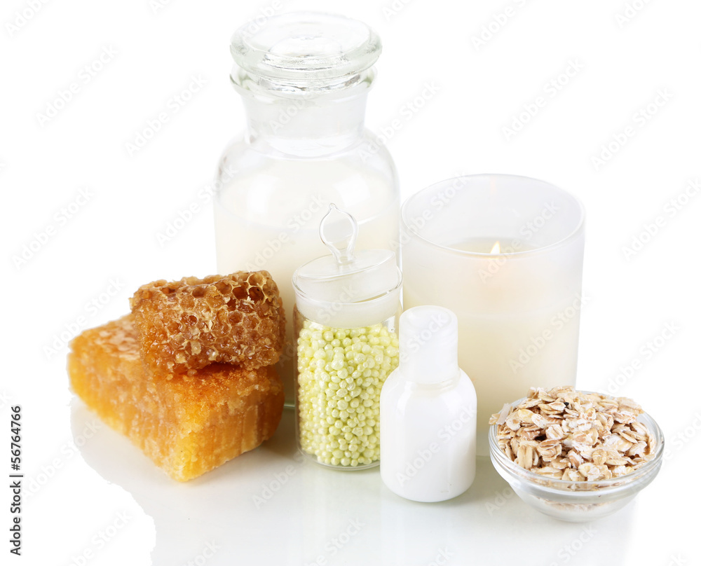 Honey and milk spa with oils and honey isolated on white Honey and milk spa with oils and honey isolated on white