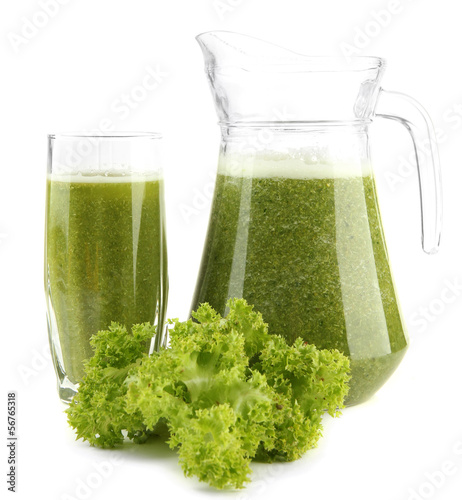 Glass and jug of green vegetable juice and salad isolated