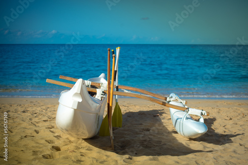 Canvas Print Canoe with outrigger on sand