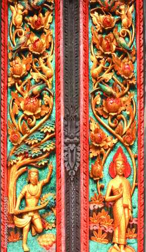 Angel figurines on the wooden door