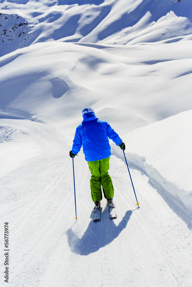 Skiing, Skier - man skiing downhill