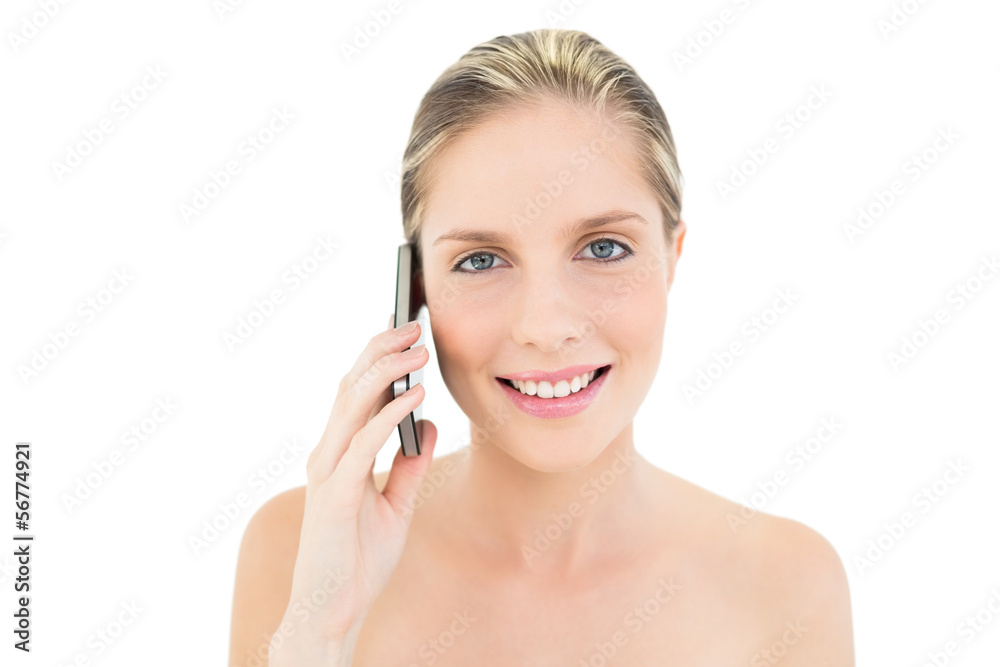 Delighted fresh blonde woman calling with her mobile phone Delighted fresh blonde woman calling with her mobile phone