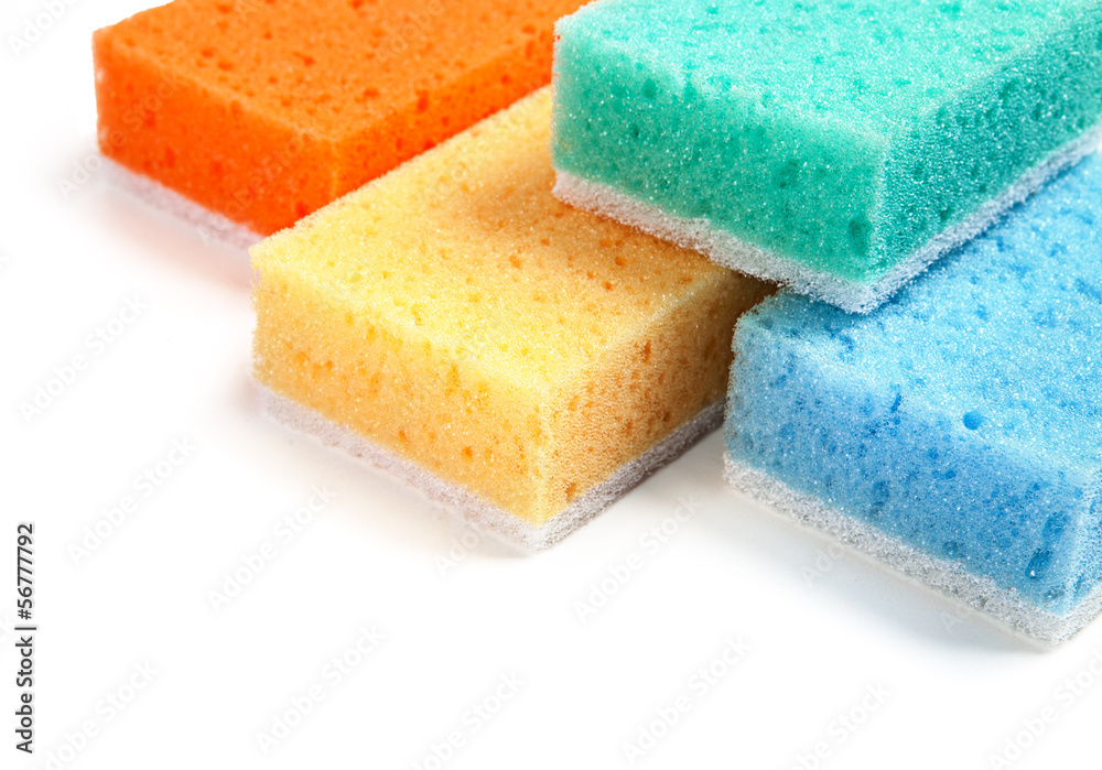Color sponges isolated on a table on a white background Color sponges isolated on a table on a white background