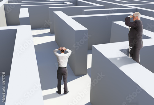 Bilde på lerret Two businessmen standing in maze