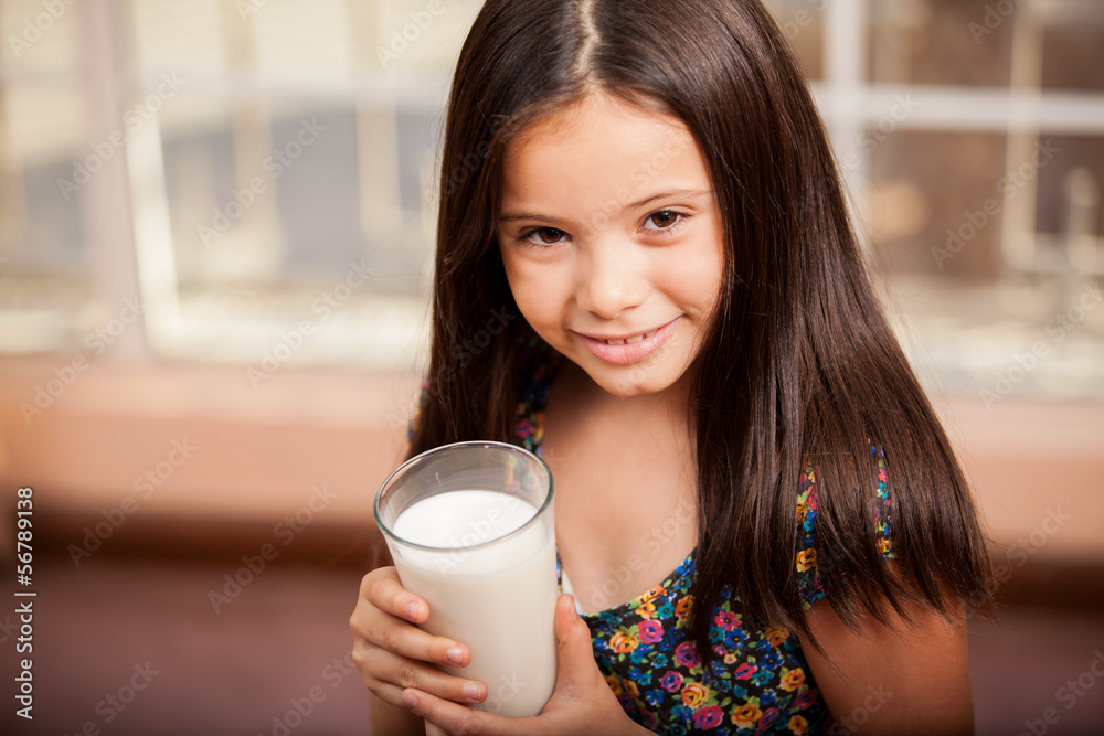 Little girl with a glass of milk Little girl with a glass of milk