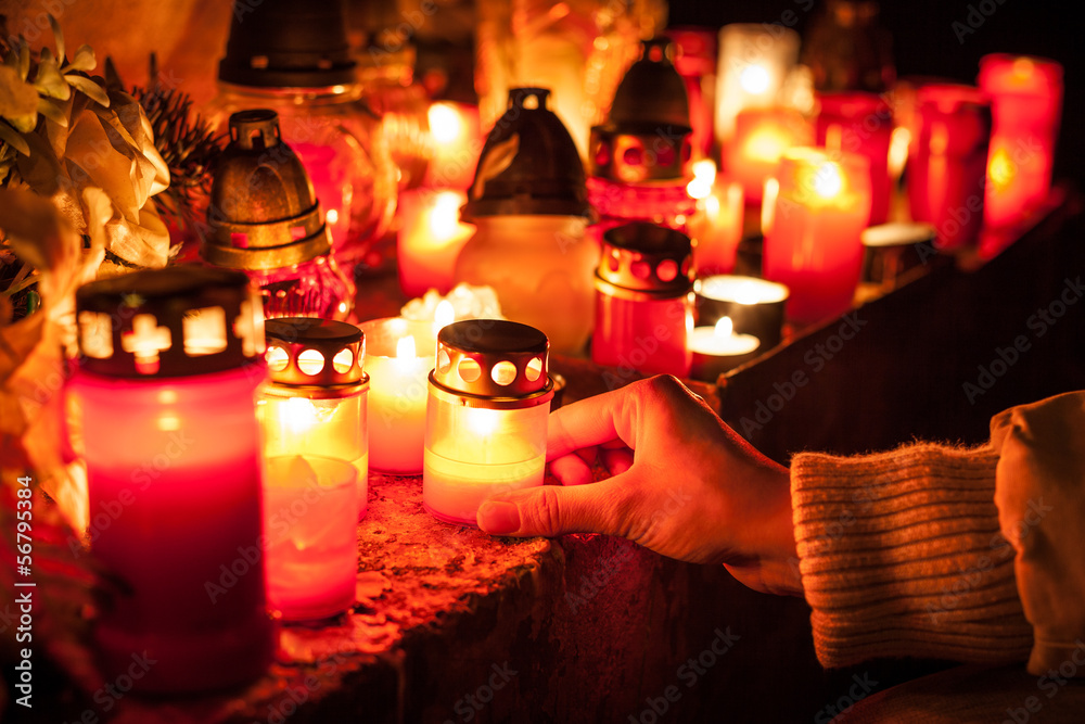 Candles Burning At a Cemetery. Shallow depth of field.