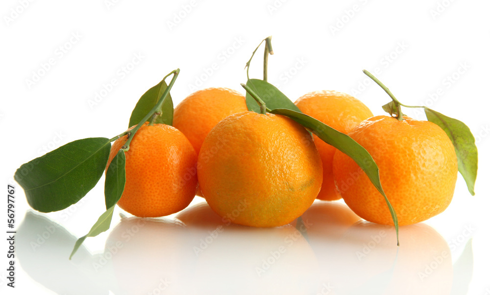 Ripe sweet tangerines with leaves, isolated on white Ripe sweet tangerines with leaves, isolated on white