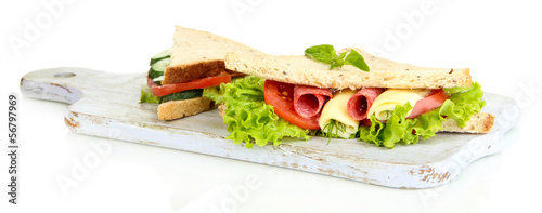 Tasty sandwiches with salami sausage and vegetables