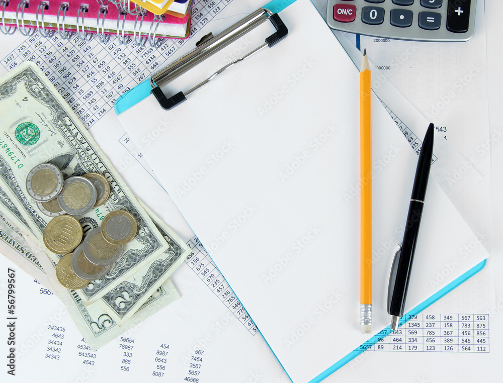 Office supplies with money and documents close up Office supplies with money and documents close up
