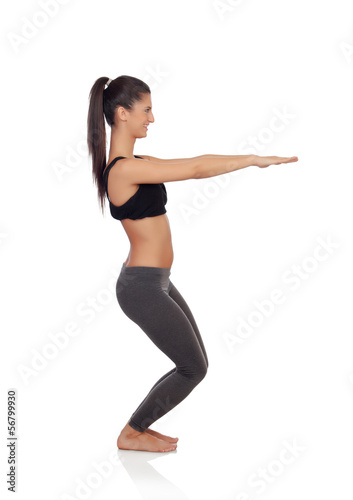 Woman doing exercises in a gym