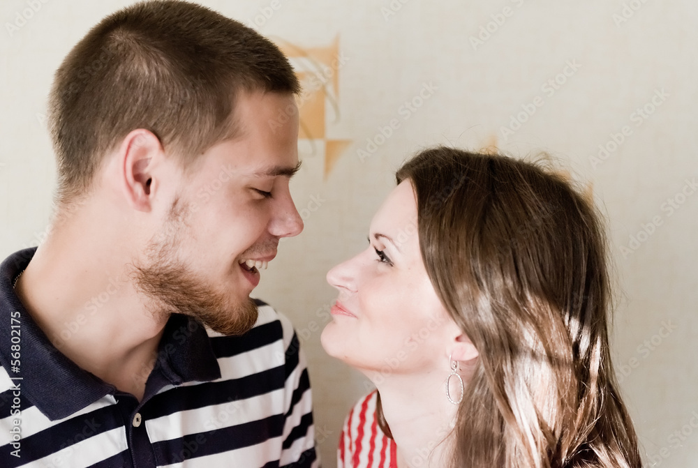 Happy Young Couple looking at each other