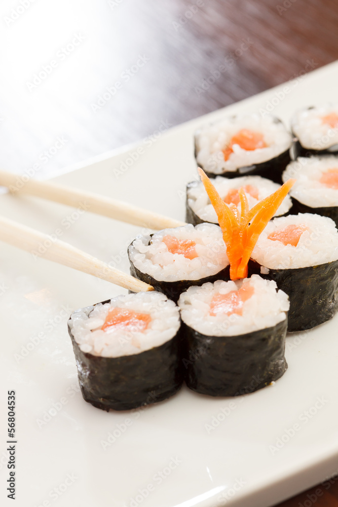 sushi with chopsticks sushi with chopsticks