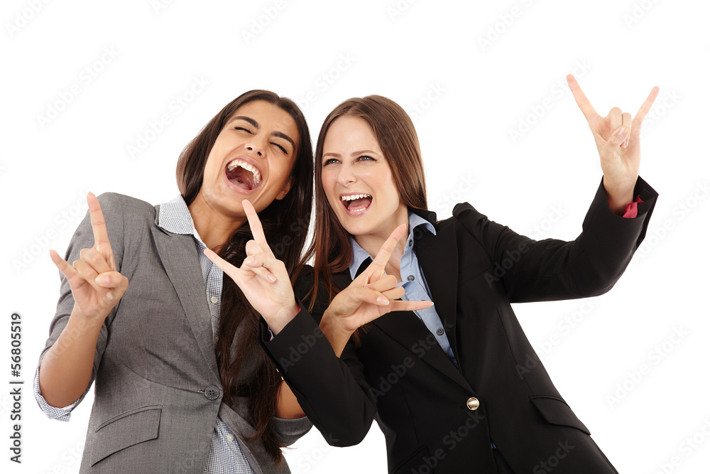 Businesswomen making the rock and roll hand gesture Businesswomen making the rock and roll hand gesture