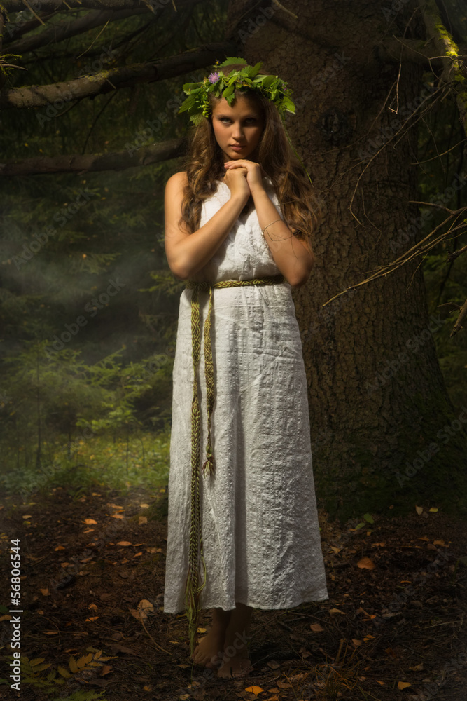 Fototapeta premium Slavonian girl in the deep forest