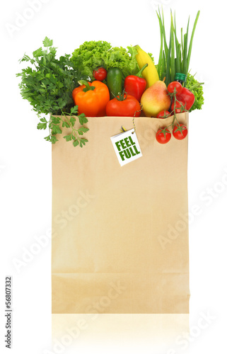 Paper bag full with fruits and vegetables