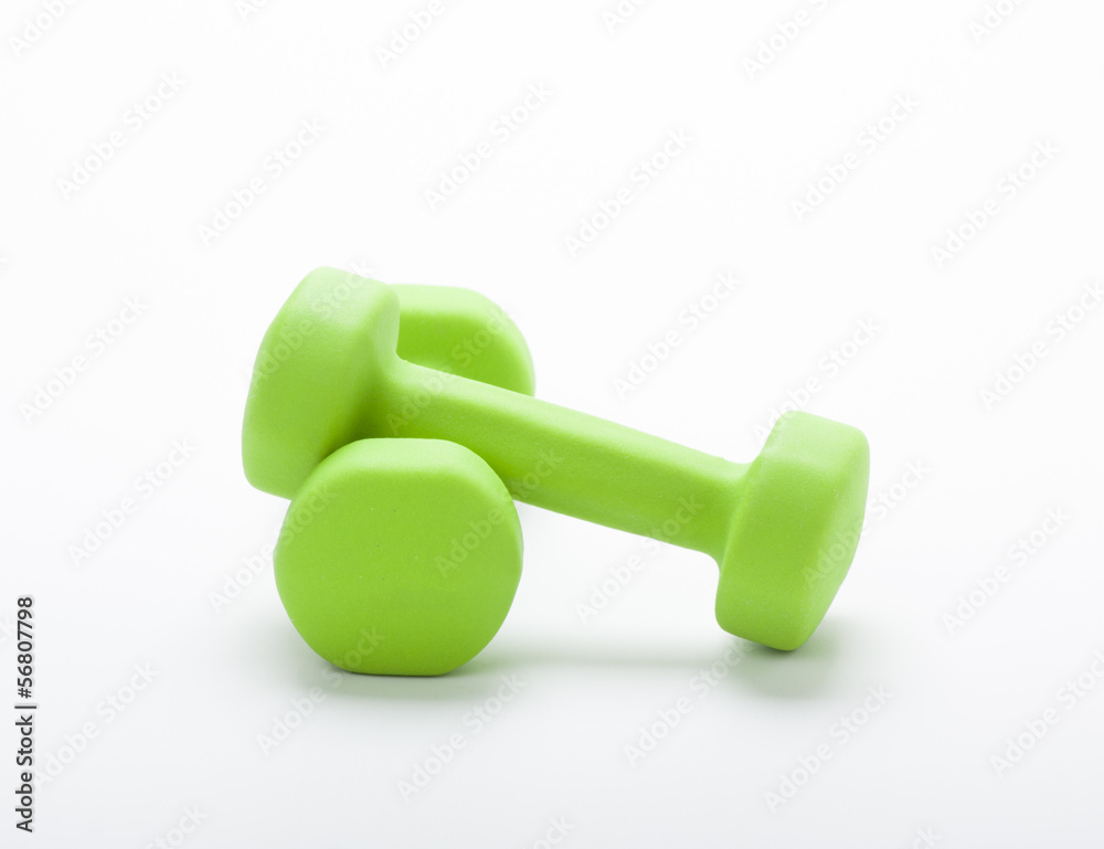 small green dumbbells, isolated in white background small green dumbbells, isolated in white background