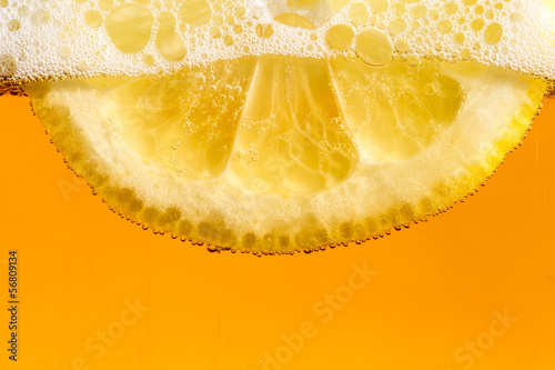 Lemon in the beer bubbles