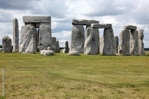 Stonehenge historic site on green grass under blue sky. Stonehen © konstantant