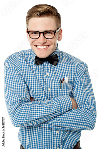 Mischievous young man posing smartly photo