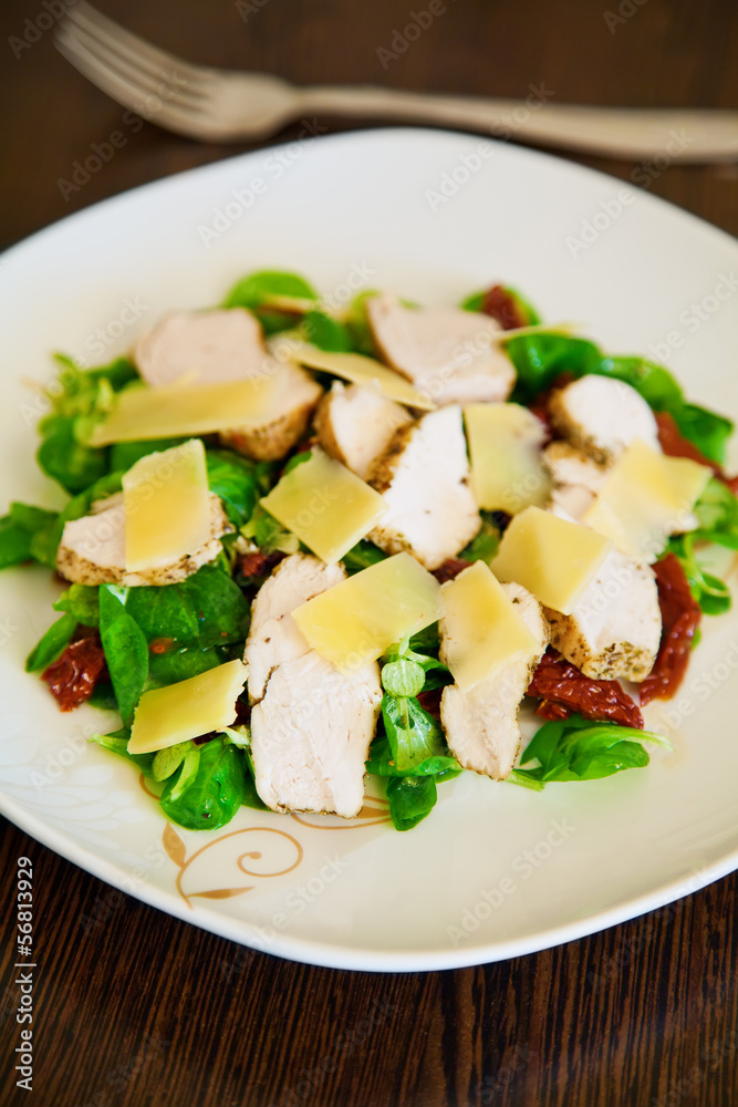 Salad with chicken and dried tomatoes Salad with chicken and dried tomatoes