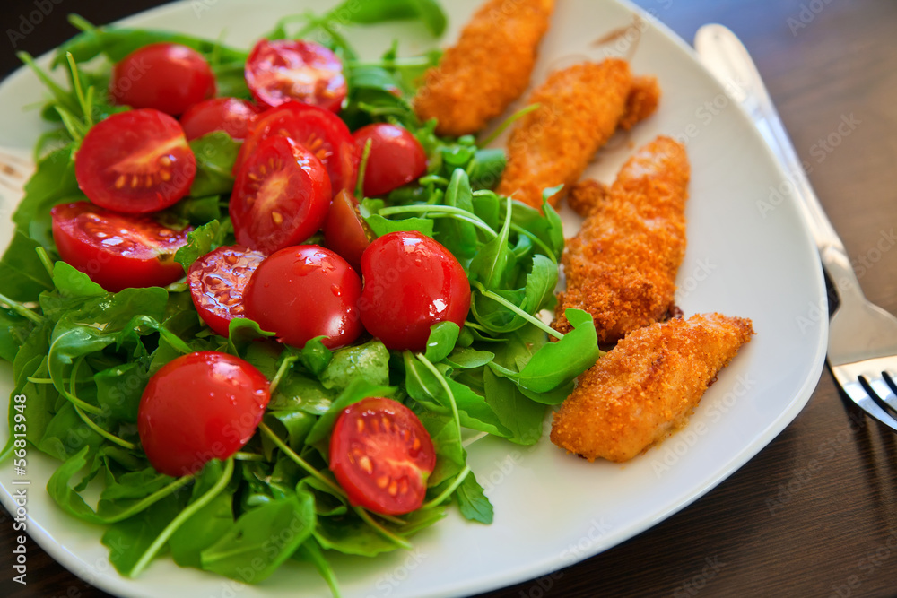 chicken nuggets with salad