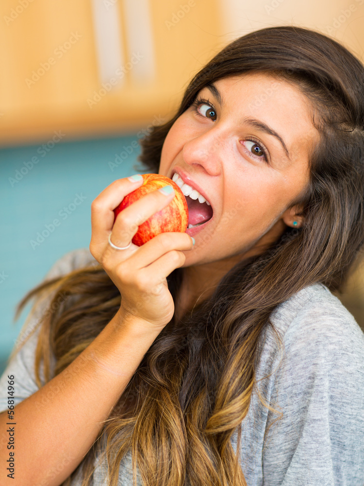 Beautiful Young Woman Holding Red Apple