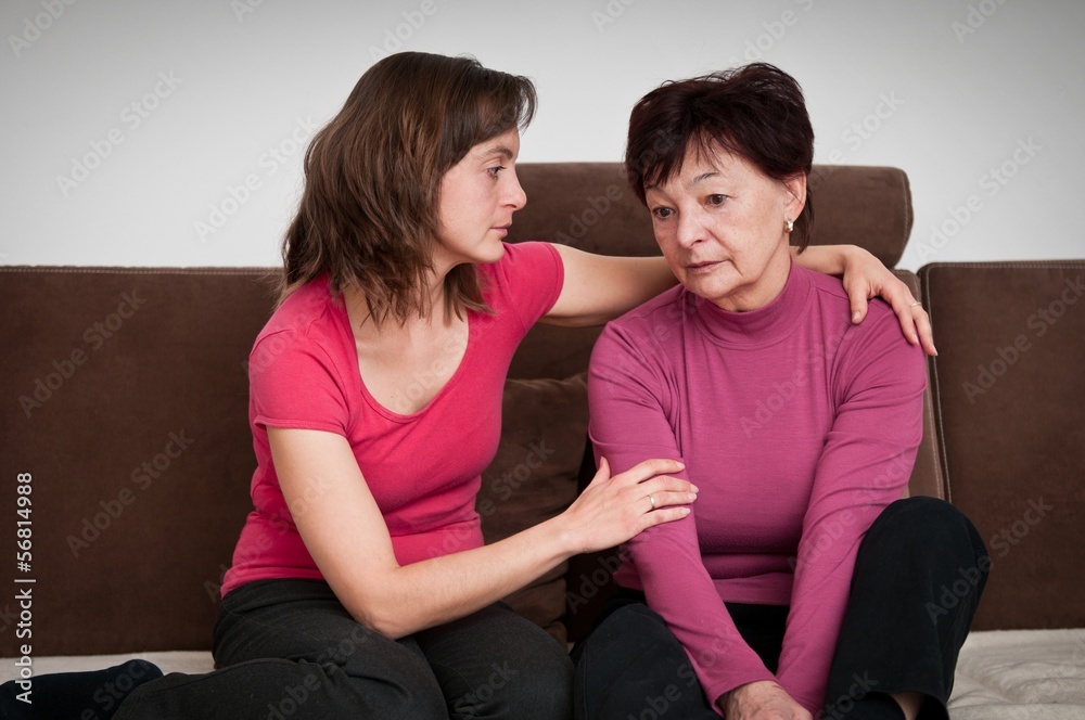 Big problems - daughter comforts senior mother Big problems - daughter comforts senior mother