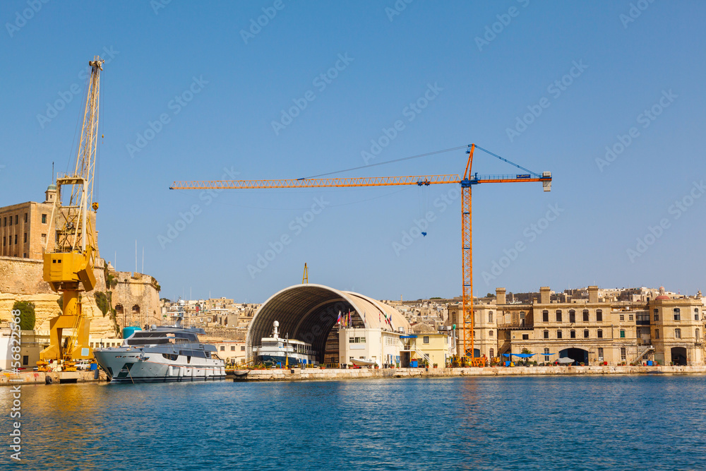 Port cargo crane in Shipyards harbor of Malta
