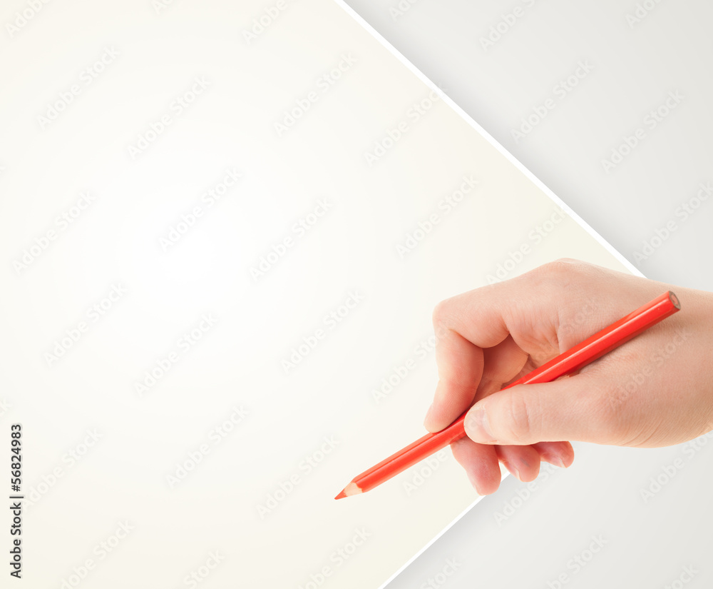 Human hand drawing with pencil on empty paper template Human hand drawing with pencil on empty paper template