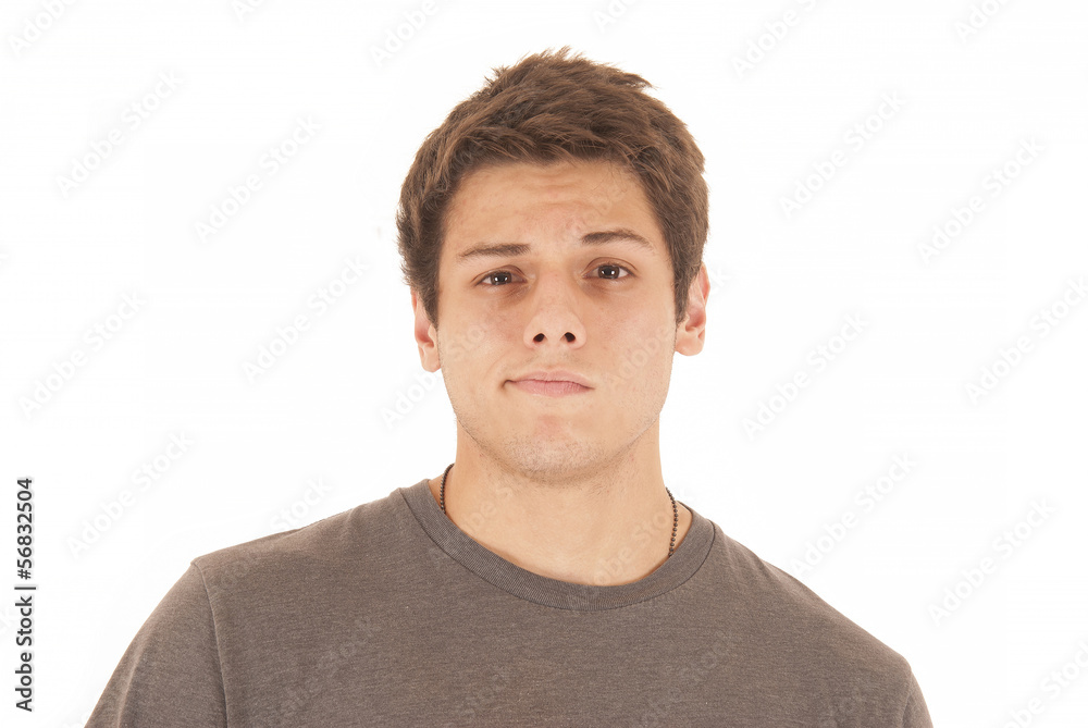 Fototapeta premium Very casual young man in gray tee shirt with I don't care facial