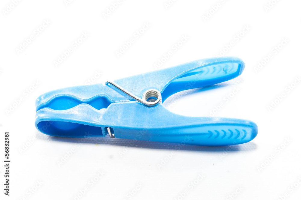 colored clothespins on a white background colored clothespins on a white background
