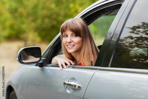 Caucasian car driver woman smiling © Rock and Wasp