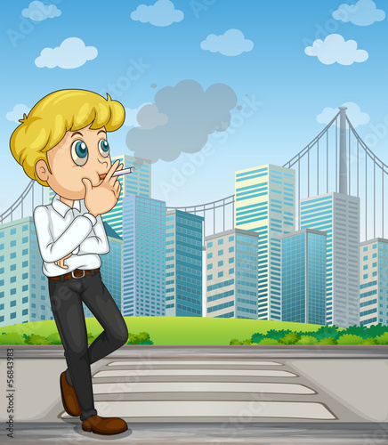 A man smoking near the pedestrian lane