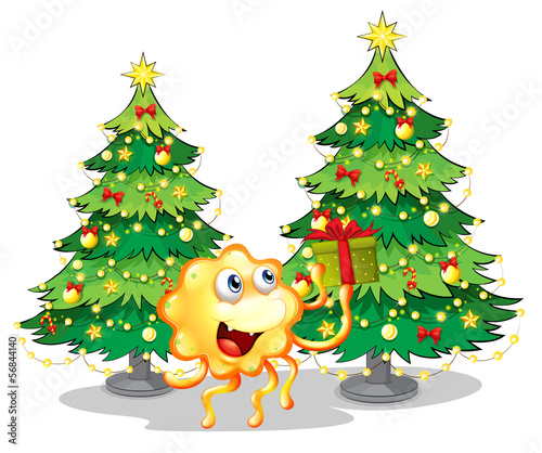 A monster near the two green christmas trees