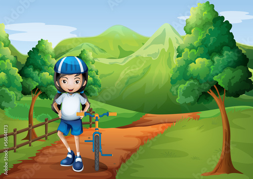 A girl at the pathway going to the hilltop