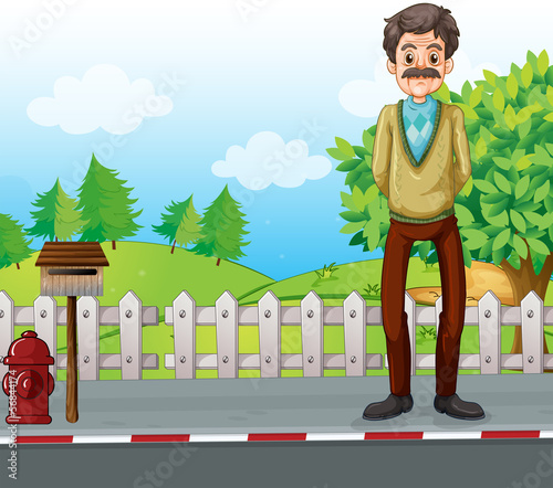 An old man at the roadside standing near the mailbox