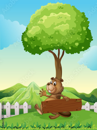 A hilltop with a beaver holding a wooden signboard