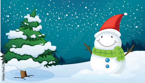 A smiling snowman near the pine tree