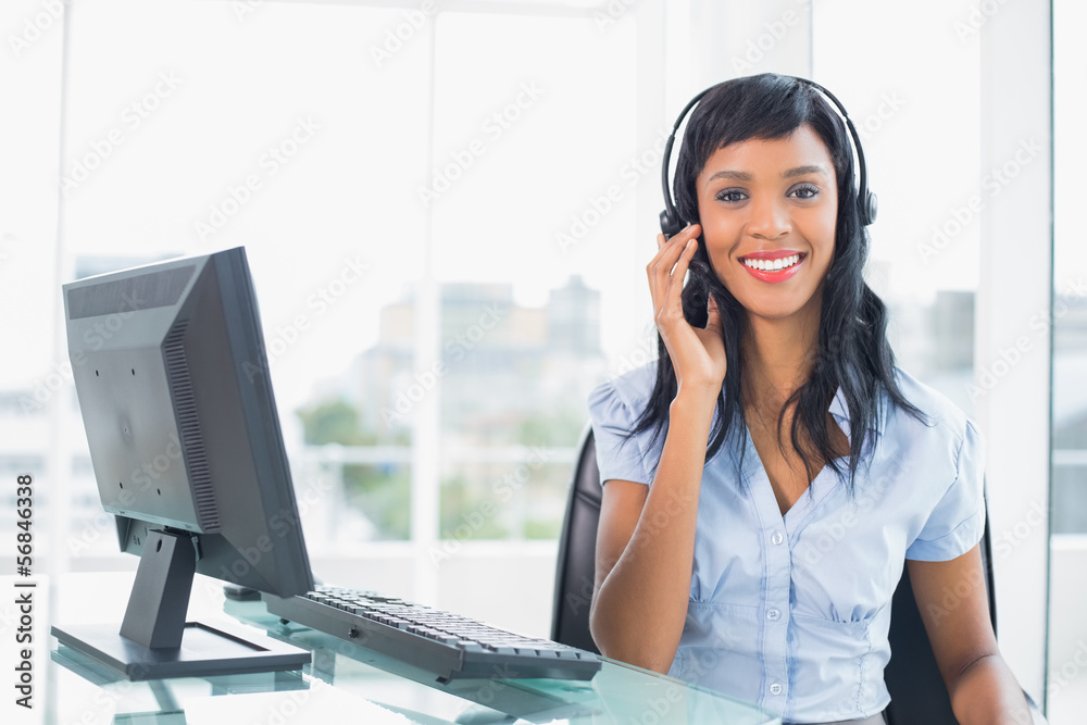 Lovely operator posing and looking at camera Lovely operator posing and looking at camera