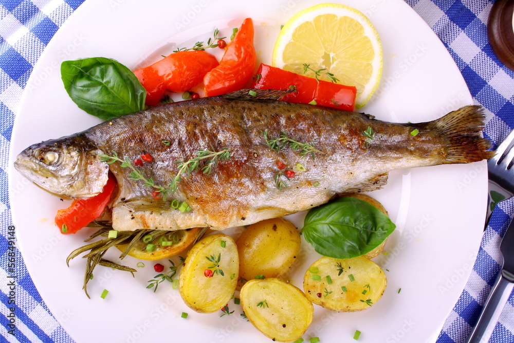 Grilled rainbow trout with potato, basil, red pepper and lemon Grilled rainbow trout with potato, basil, red pepper and lemon