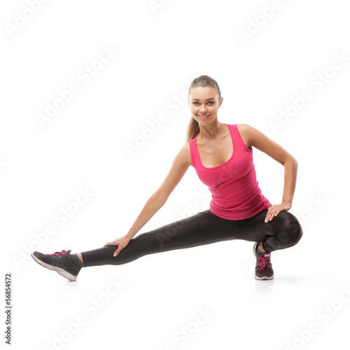Smiling beautiful woman doing exercise