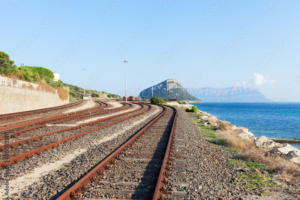 Railway at Mediterranean sea, Sardinia, Italy.