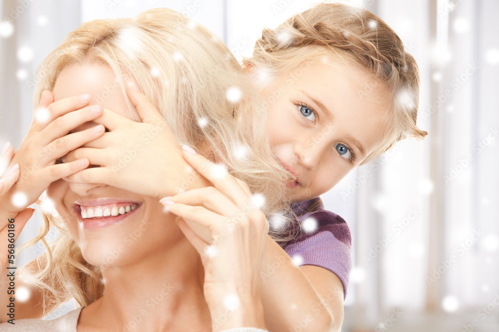 mother and daughter making a joke mother and daughter making a joke