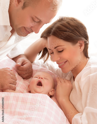 Newborn baby with parents