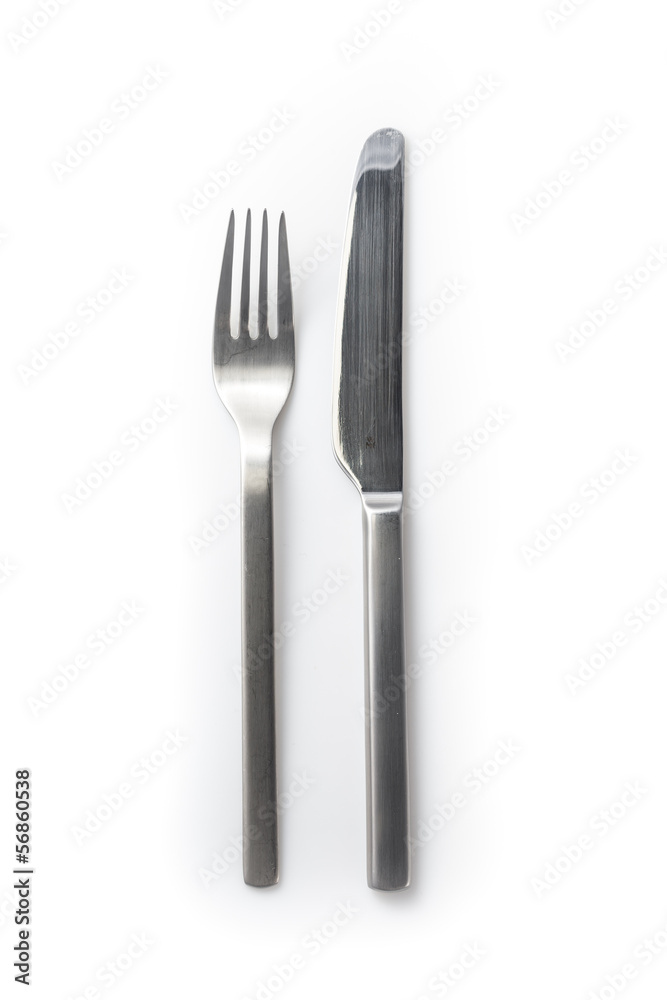 stainless steel knife and fork isolated on a white background stainless steel knife and fork isolated on a white background