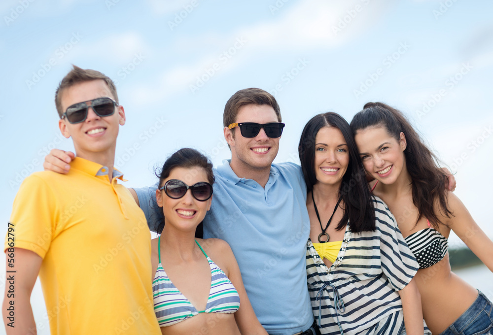 group of friends having fun on the beach group of friends having fun on the beach